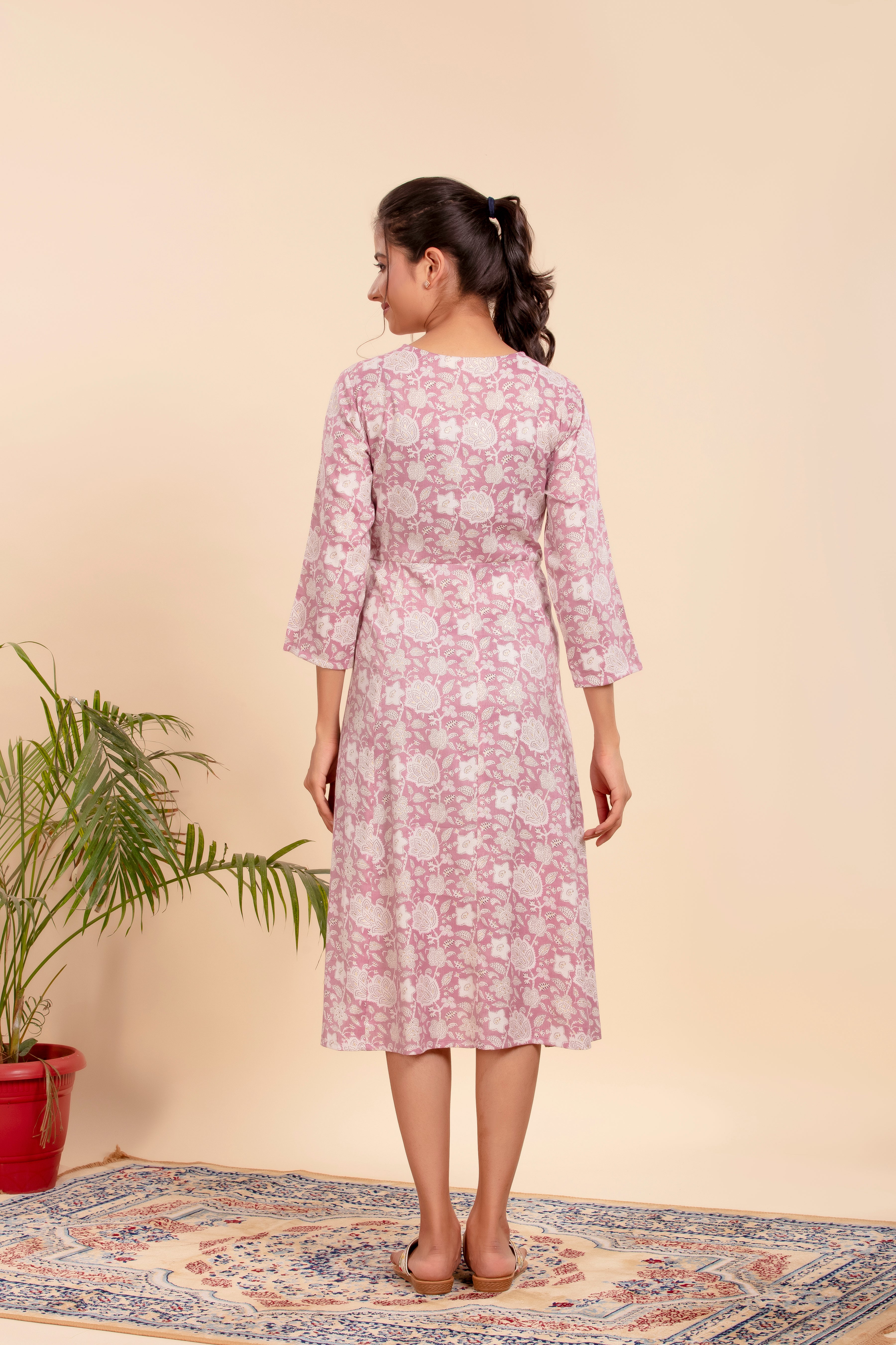 Dress with Elegant Floral Print and a Flattering Tie-Up Waist.