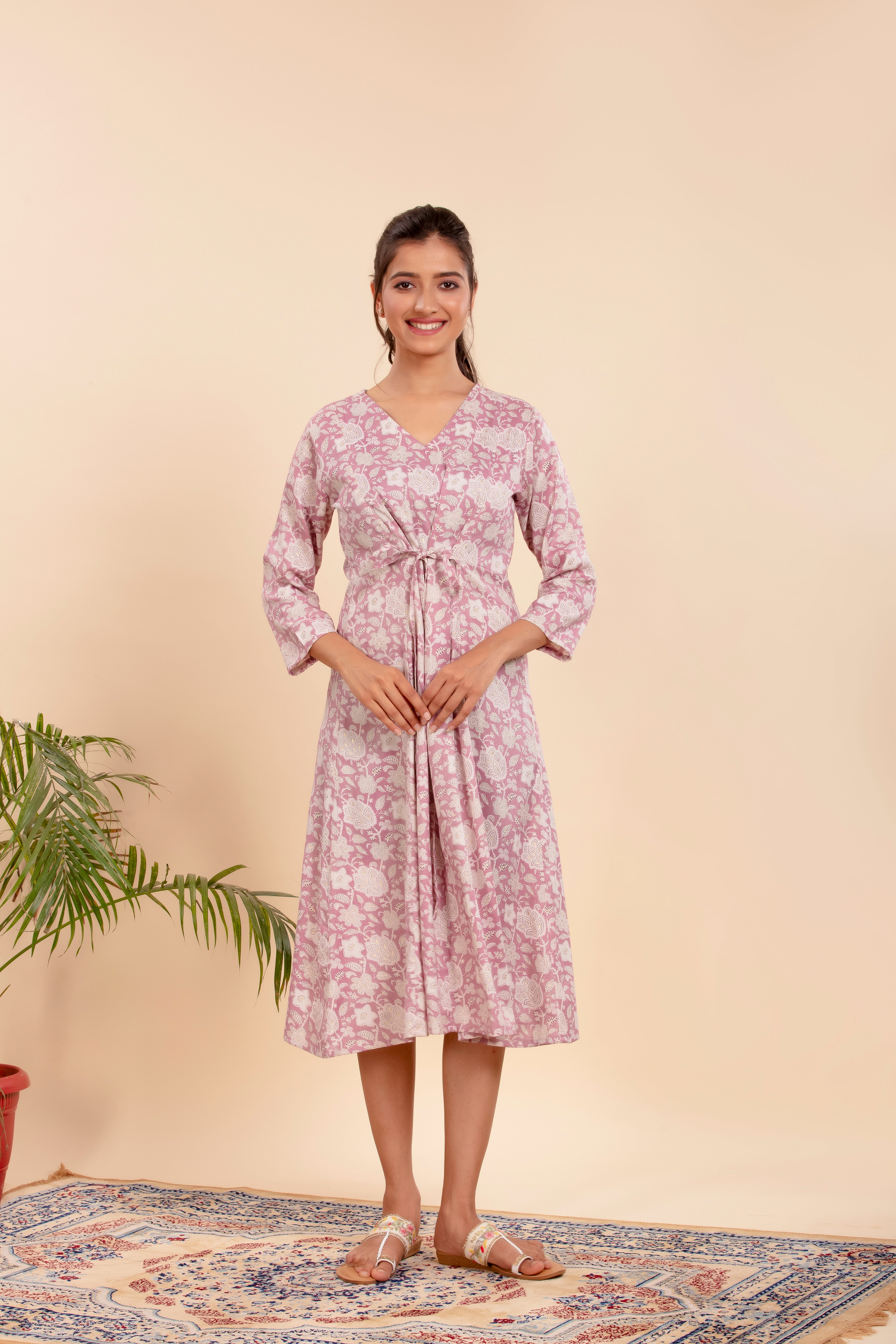 Dress with Elegant Floral Print and a Flattering Tie-Up Waist.