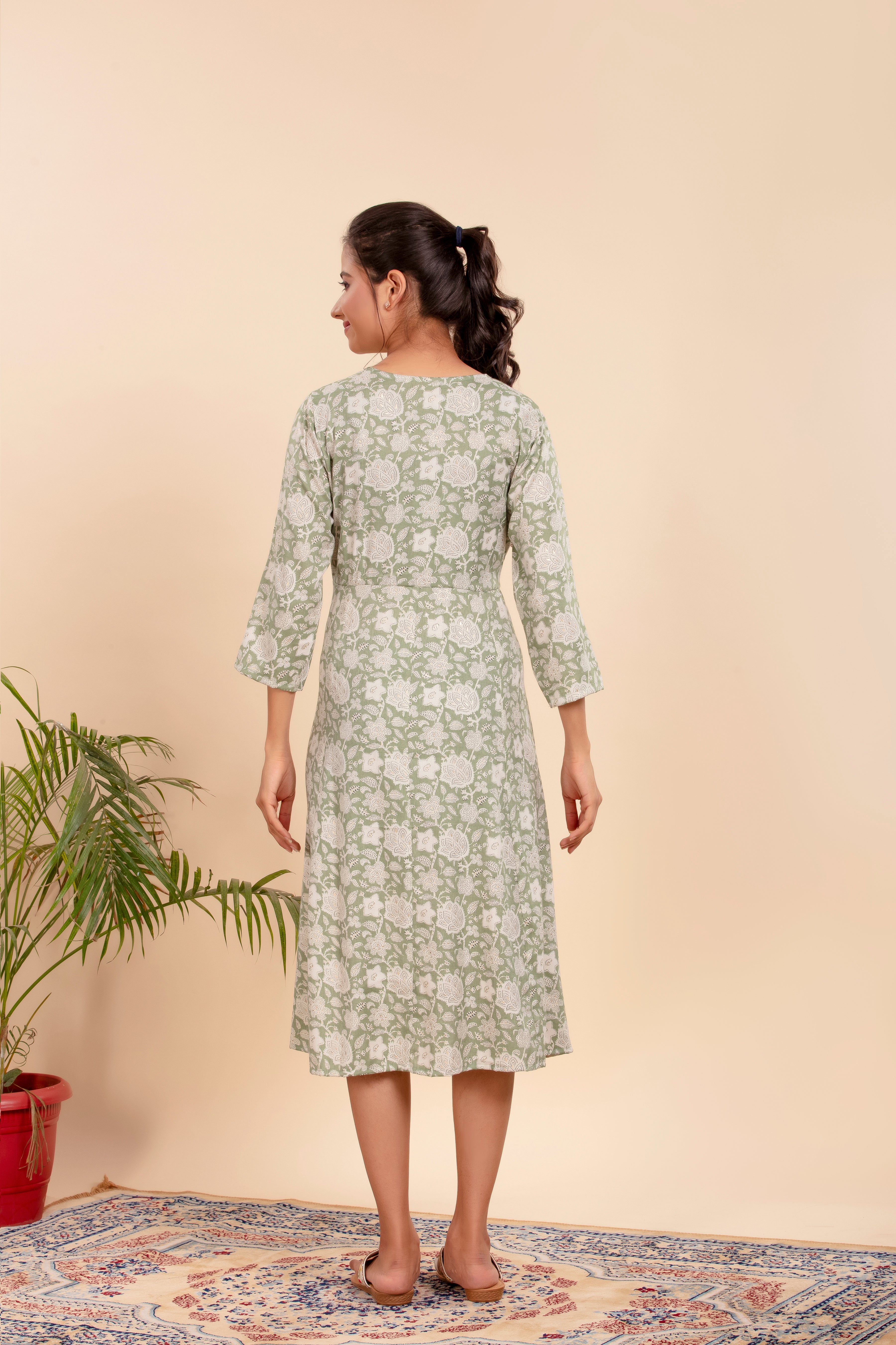 Dress with Elegant Floral Print and a Flattering Tie-Up Waist.