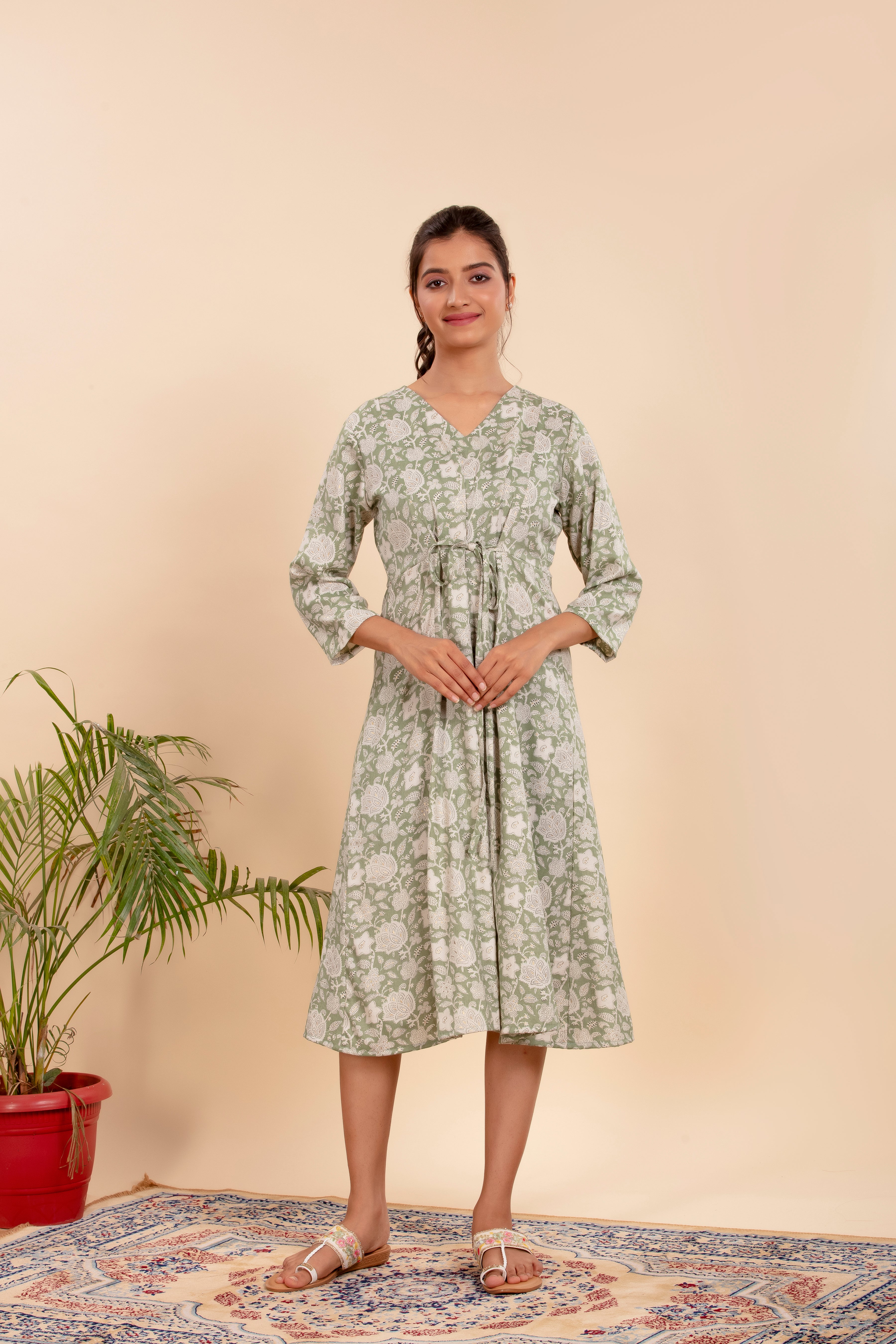 Dress with Elegant Floral Print and a Flattering Tie-Up Waist.