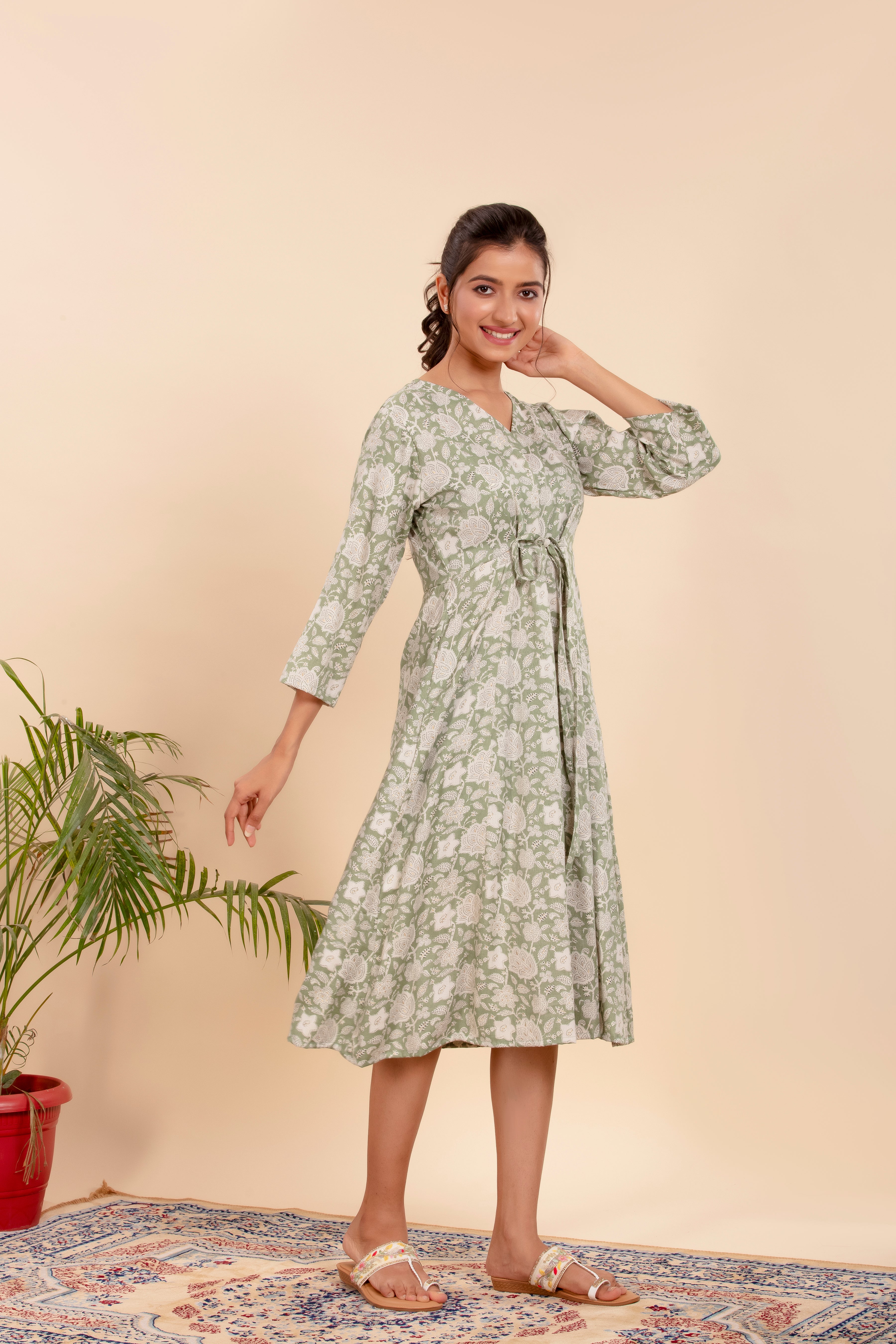Dress with Elegant Floral Print and a Flattering Tie-Up Waist.