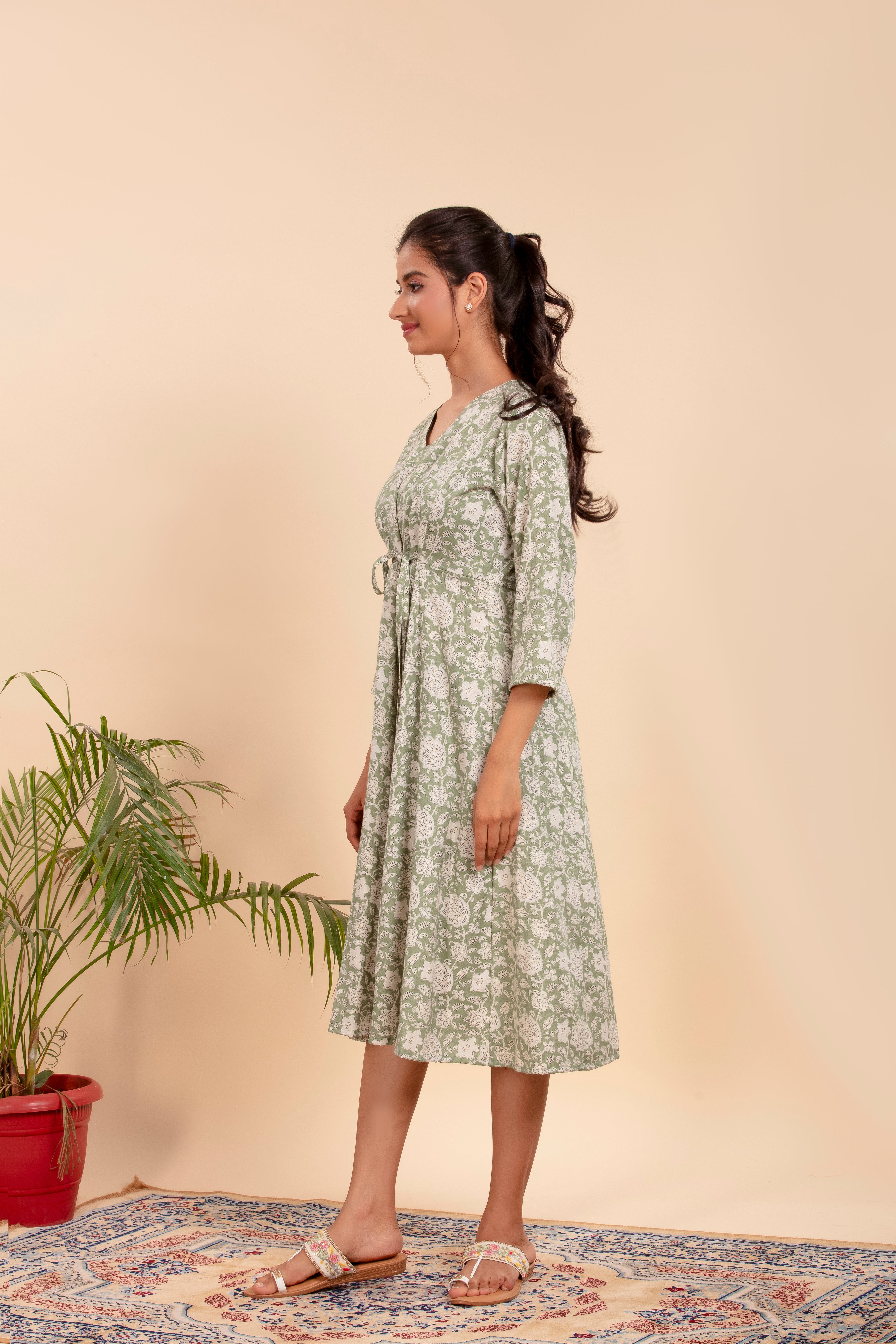 Dress with Elegant Floral Print and a Flattering Tie-Up Waist.