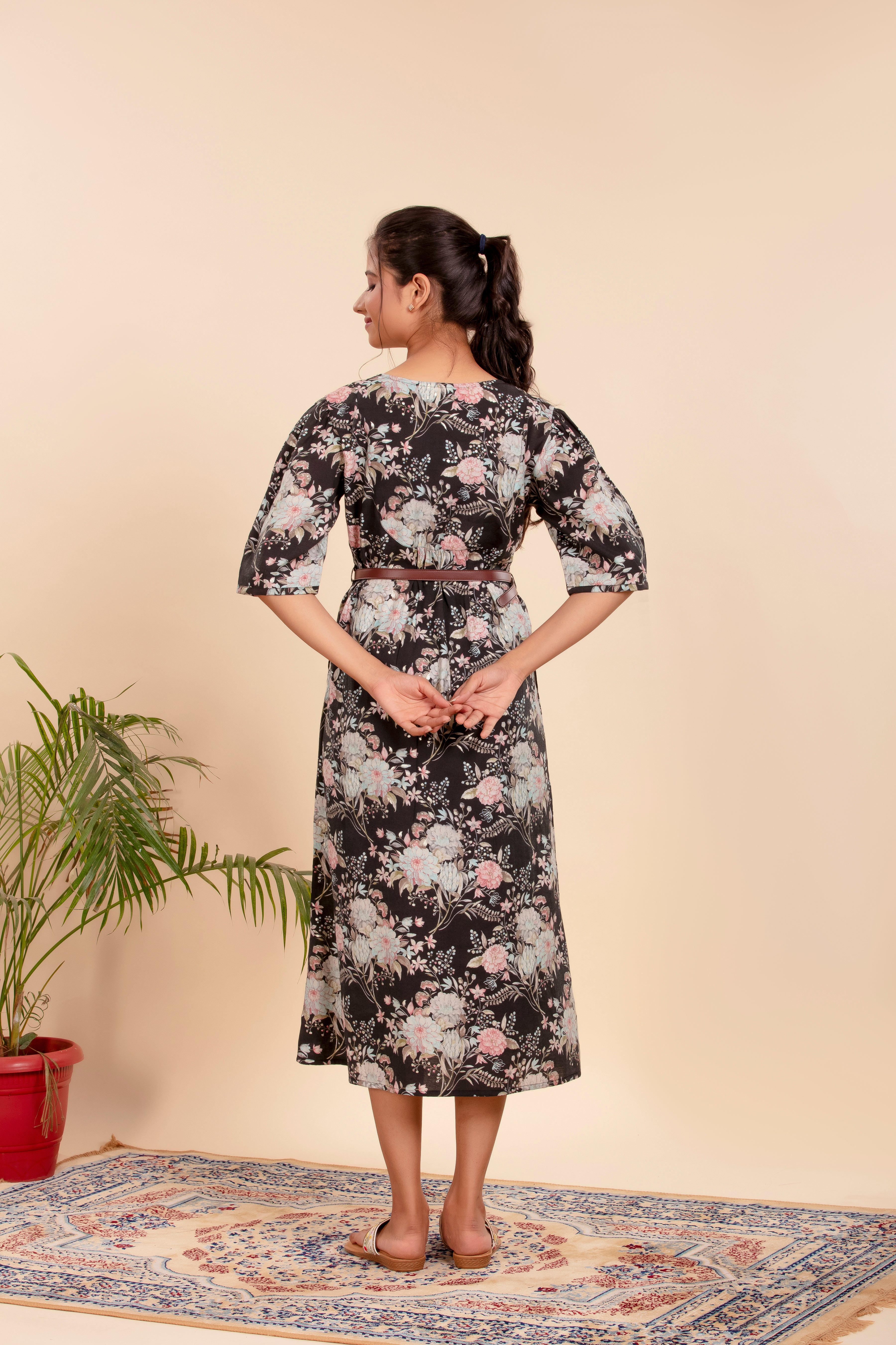 Dress Featuring a Beautiful Floral Print with a Stylish Waist Belt.