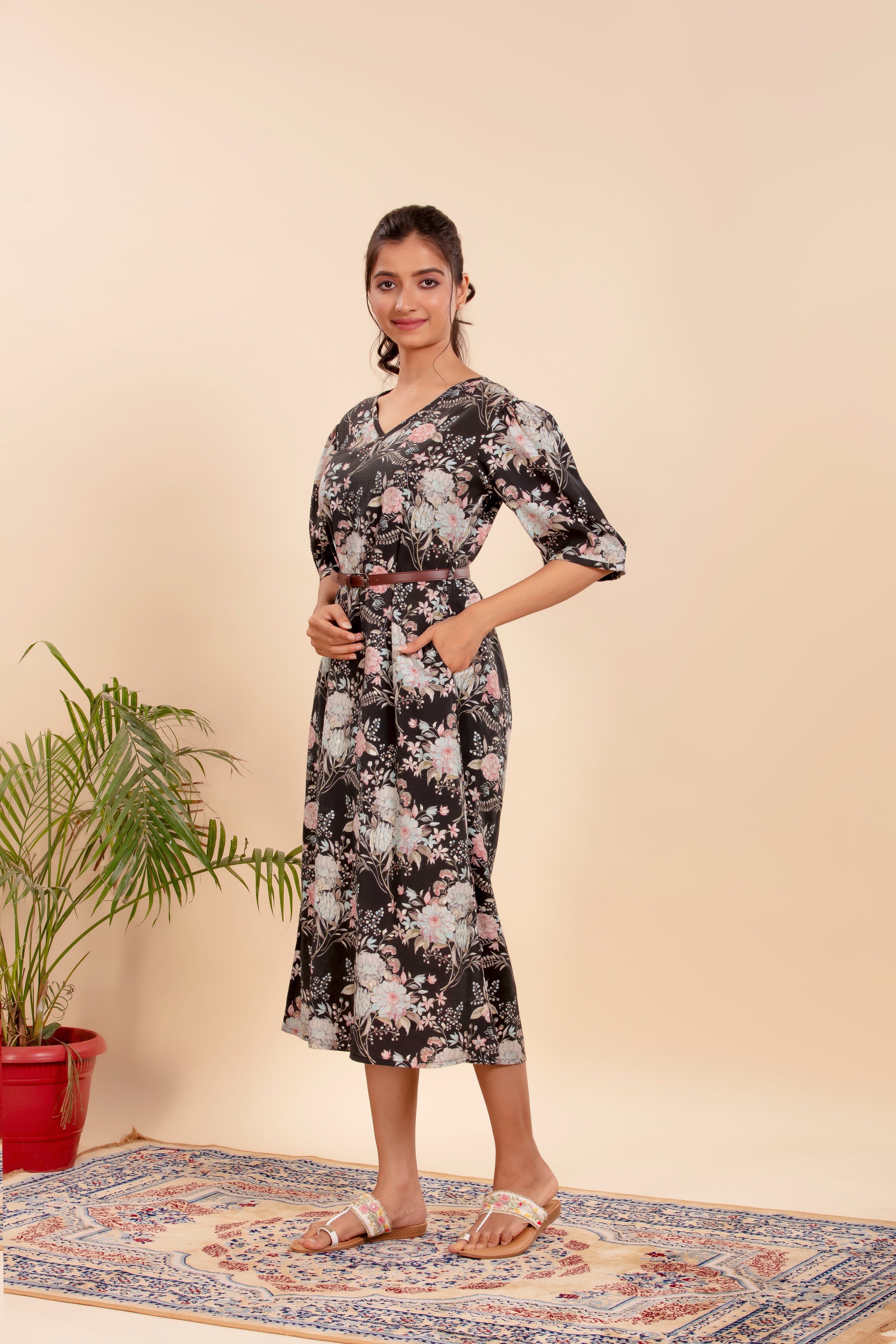 Dress Featuring a Beautiful Floral Print with a Stylish Waist Belt.