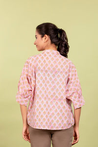 Oversized Top in Cotton with a Soft Pink Block Print, Perfect for Everyday Comfort.