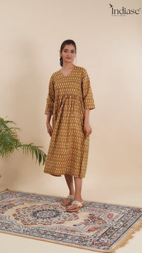 Dress Up in Effortless Style with this Mustard Ikat-Printed Midi Dress.
