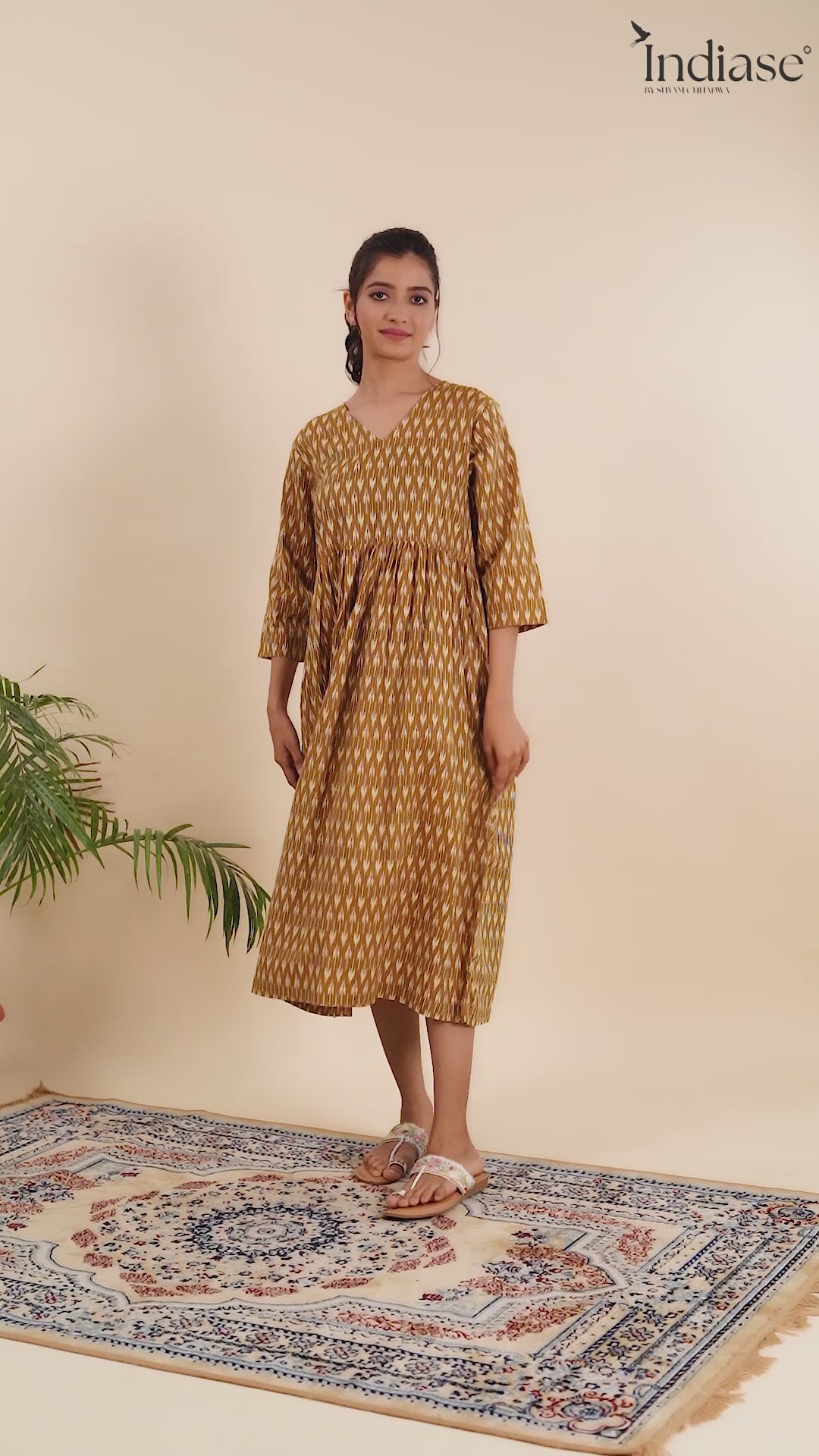 Dress Up in Effortless Style with this Mustard Ikat-Printed Midi Dress.