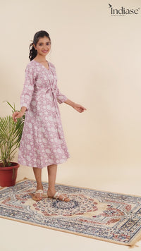 Dress with Elegant Floral Print and a Flattering Tie-Up Waist.