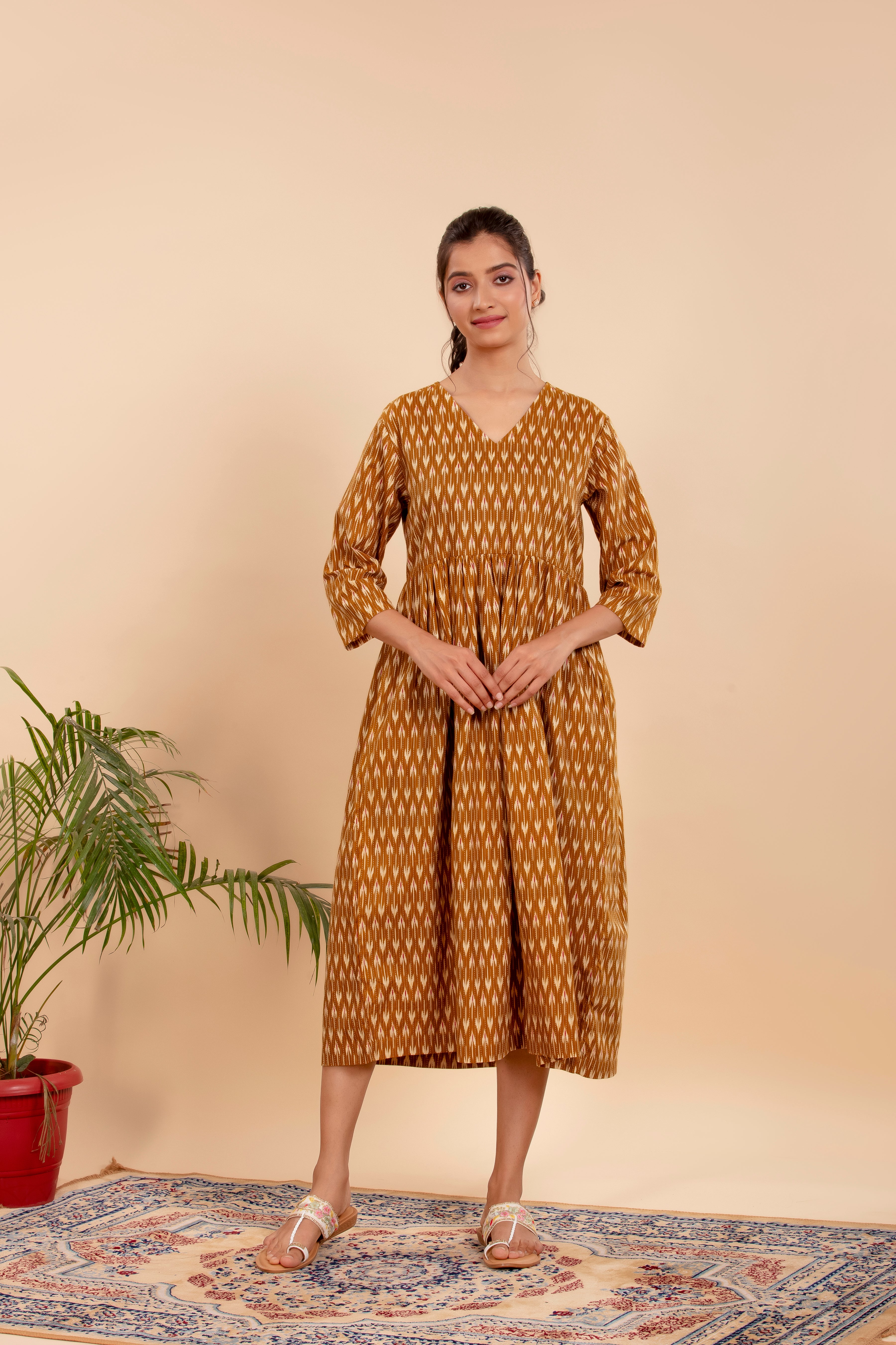 Dress Up in Effortless Style with this Mustard Ikat-Printed Midi Dress.