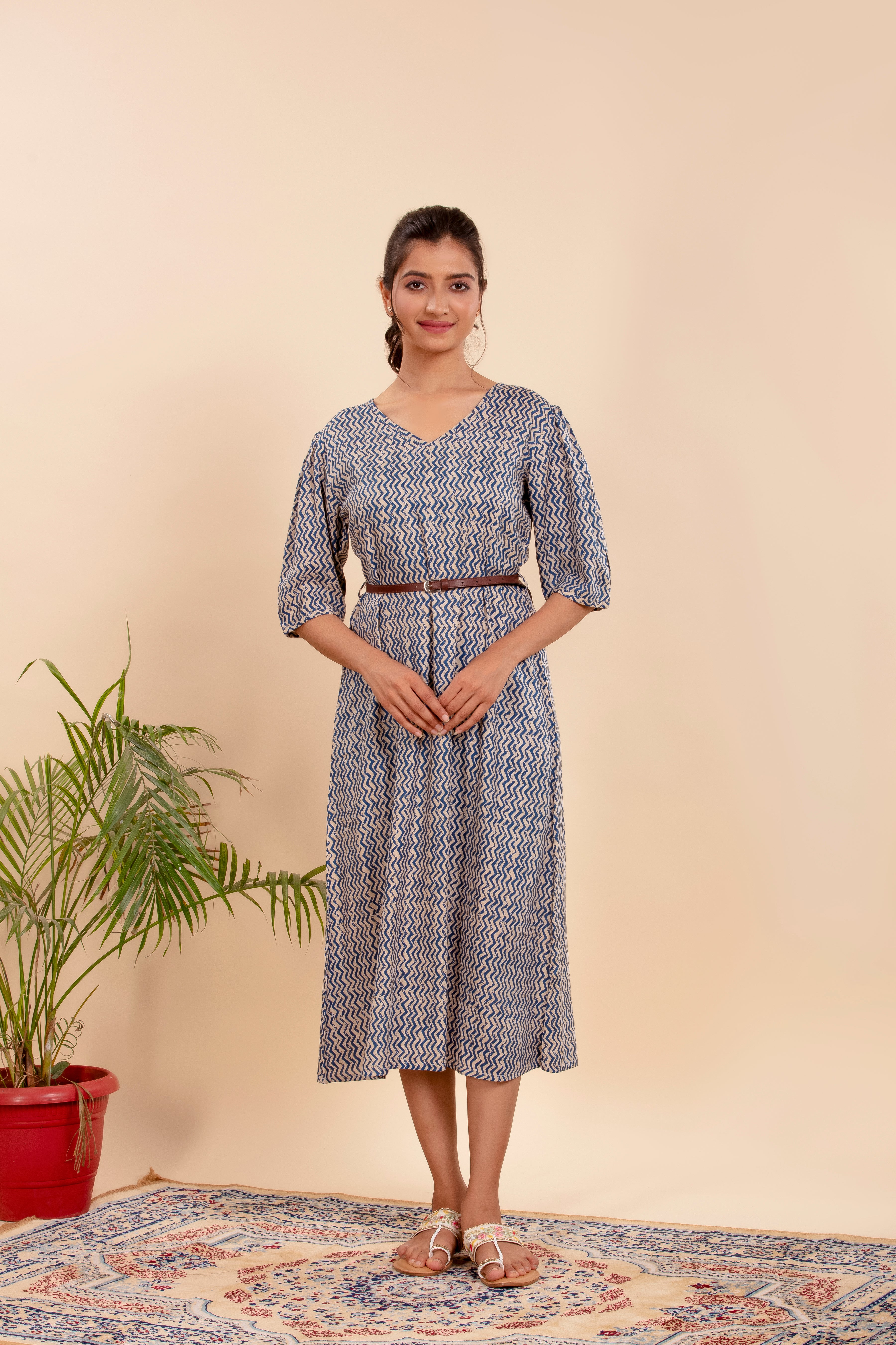 Dress with a Chic Print, Comfy Fit, and a Stylish Waist Belt.