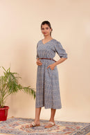 Dress with a Chic Print, Comfy Fit, and a Stylish Waist Belt.