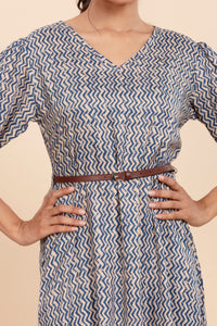 Dress with a Chic Print, Comfy Fit, and a Stylish Waist Belt.