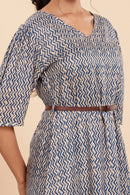 Dress with a Chic Print, Comfy Fit, and a Stylish Waist Belt.