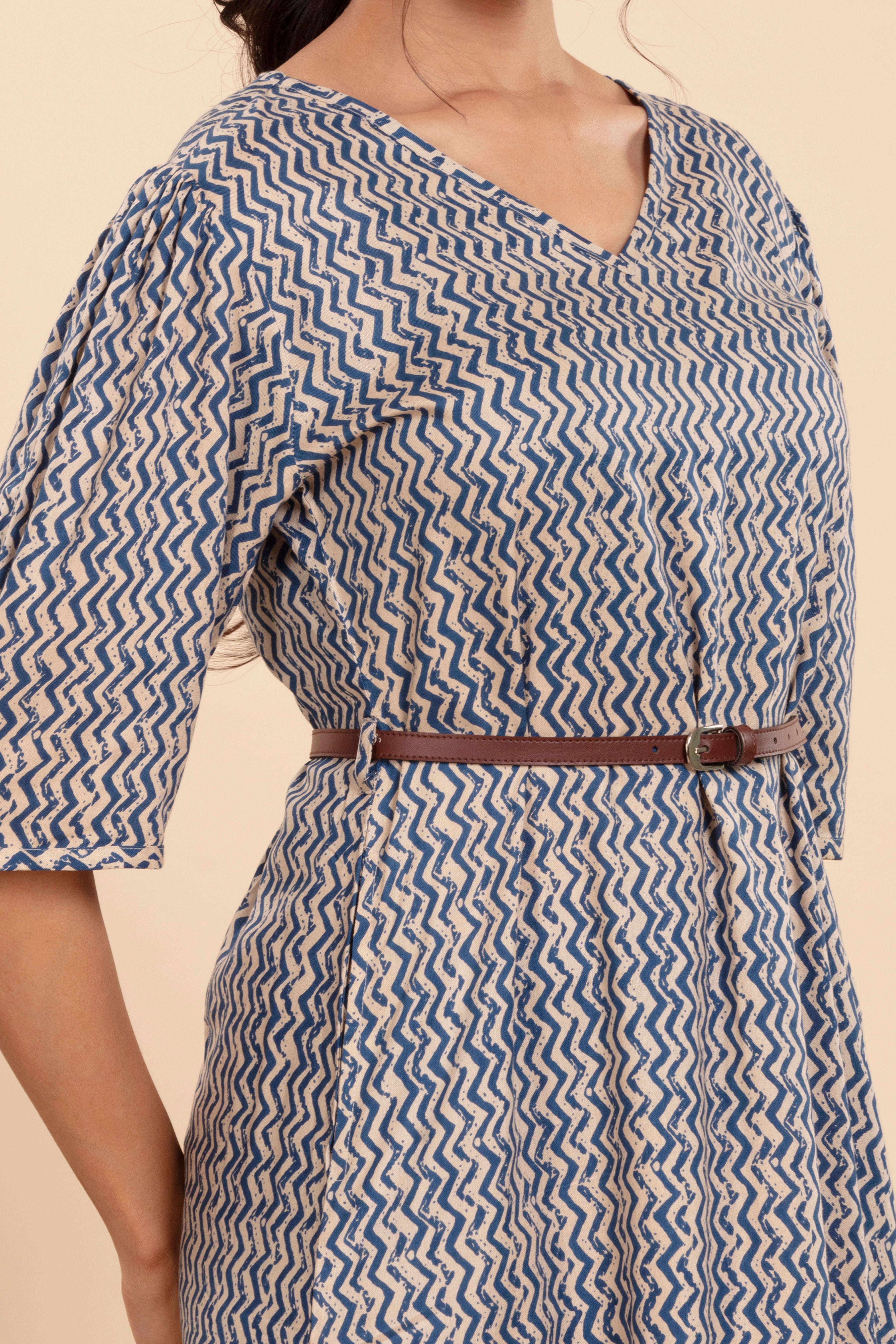 Dress with a Chic Print, Comfy Fit, and a Stylish Waist Belt.